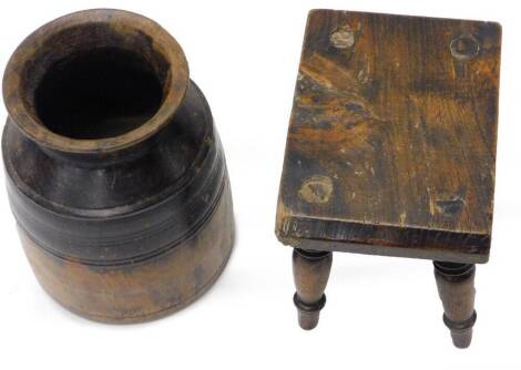An Eastern ebonised hardwood vase, and a rectangular small footstool, 28cm W.