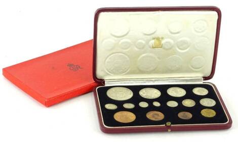 A 1937 George VI specimen coin set, in a leather case and a further case, etc.