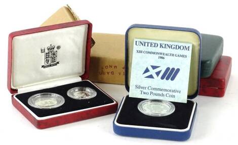 Various silver £1 and £2 coins, mainly commemorative issues.