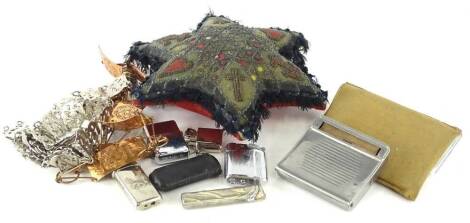 A quantity of collectables to include lighters, a silver plated belt, plated card cases and a beadwork pin cushion of nautical or naval interest.