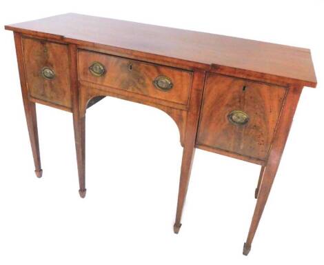 A 19thC mahogany breakfront sideboard, with central drawer flanked by two doors, on square tapering legs, 131cm W.