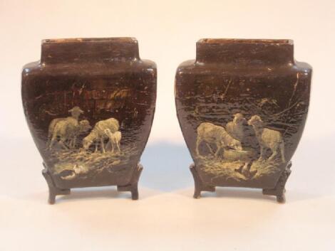 A pair of late 19thC French earthenware slab vases