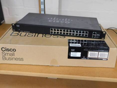 A CISCO small business 24 port 10/100 switch with Gigabit Uplinks.