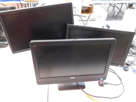 Three Dell LCD monitors.