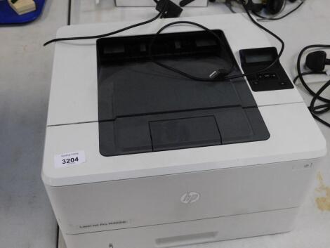 An HP Laserjet Pro M402dn printer.