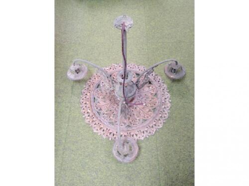 A Victorian cast iron ceiling rose of pierced form