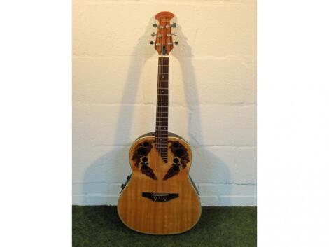 A Tanglewood Autumn Leaf semi acoustic guitar