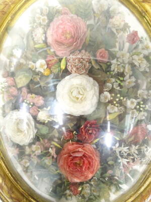 A mid 19thC French silk flower display, representing roses, leaves and other similar flowers, in oval gesso frame, the crest decorated with a bow, etc., exhibition plaque titled Fleurs, ACAILLES de POISSONS, brevet de l'exposition 1855, 61cm x 41cm. - 4