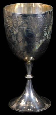 Withdrawn Pre-Sale by vendor A Victorian silver goblet, the egg shaped bowl on and inverted stem and circular bead lined foot, heavily chased with a repeat geometric and floral pattern, engraved Reg 87 Sculls, won by A D Whitehead, presented by The Mayor