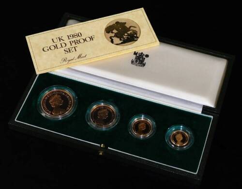 An Elizabeth II gold proof coin set, comprising £5, £2, sovereign and half sovereign, 1980, in green box, 22cm W and outer packaging.