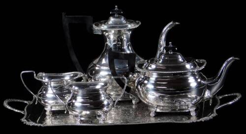 A 20thC silver plated four piece tea and coffee service, comprising coffee pot, 24cm H, teapot, two handled sugar bowl and milk jug, and a similar bright cut tray, with part gadrooned handles. (5)