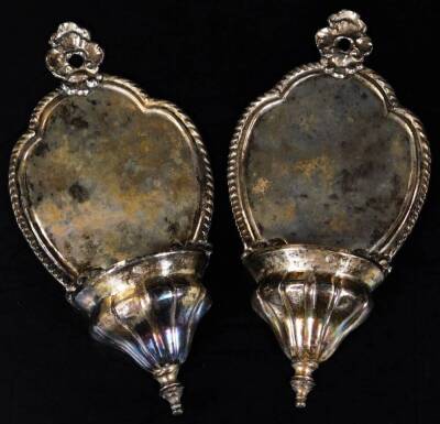 A pair of 19thC Italian silver water stoops, each with shaped backs, partially gadrooned and surmounted by pierced ribbon hangings, with gadrooned fronts, continental white metal, each marked, 27cm H. (2)