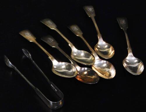 A set of six Victorian silver teaspoons, fiddle pattern, initialled, Sheffield 1897, 14cm W, and a pair of sugar bows, 4½oz. (7)