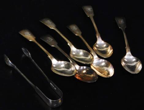 A set of six Victorian silver teaspoons, fiddle pattern, initialled, Sheffield 1897, 14cm W, and a pair of sugar bows, 4½oz. (7)