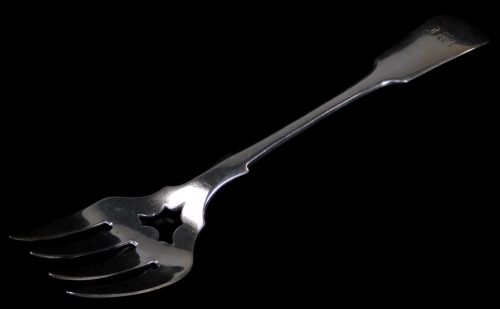 A Victorian Edinburgh silver serving fork, fiddle pattern with pierced four pronged end, initialled, Edinburgh 1856, 26cm W, 3½oz.