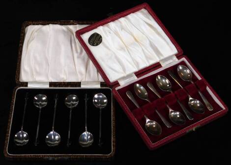 A cased set of six George V silver coffee bean spoons, each with rat tail circular bowls, Birmingham 1926, 9cm W, a further cased set of six silver teaspoons, 2½oz all in. (2 cases)