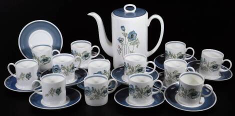 A Wedgwood Susie Cooper design coffee service, decorated with flowers, comprising coffee pot, 23cm H, coffee cans and saucers, printed marks beneath. (a quantity)