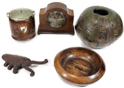 An Edwardian mahogany mantel clock, the shaped case on compressed gilt metal bun feet, with 8cm Dia. Arabic dial, marked Frank Garner, Spilsby, hour striking movement, 17cm H, a Studio pottery bowl with narrow centre, an oak biscuit barrel, a turned bowl 