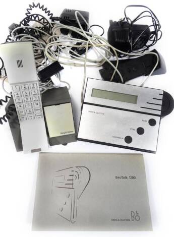 A Bang & Olufsen BeoTalk 1200 answer machine set, 11cm H, with paperwork.