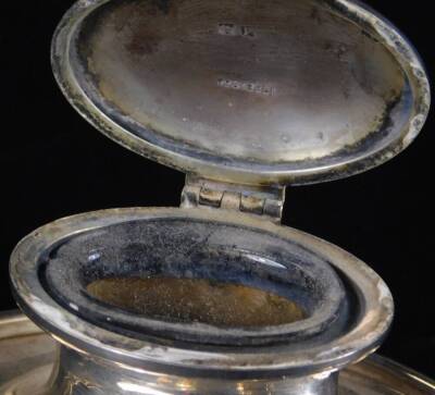 A George V silver inkwell, of oval form with single well with glass liner, Birmingham 1914, 11cm W, 6½oz all in. (weighted) - 3