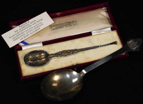 A silver anointing spoon, for the Coronation of King George VI and Queen Elizabeth, 14cm W (cased) and a reproduction silver trefoil spoon engraved with crest, 2½oz. (2)