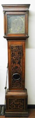 Joseph Saer, Perpoole Laine, London. A Queen Anne provincial walnut and marquetry inlaid longcase clock, with square hood, long trunk door with oval glass, heavily inlaid with birds, vases and flowers, on a similar designed base, 26cm W dial with raised - 2