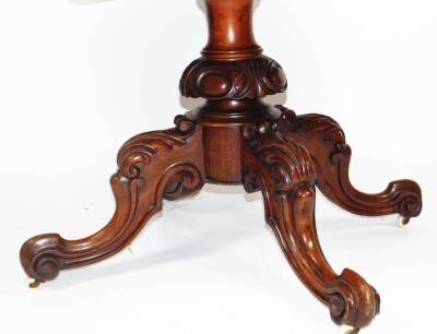 A Victorian walnut and string inlaid loo table, of oval form, on a heavy baluster stem terminating in quadruple carved cabriole legs with scroll feet, terminating in castors, 82cm H, 147cm W, 115cm D. - 3