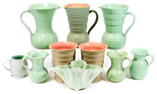 Various Bourne Denby and Lovatt Langley ewers and jugs, plus a flower vase, all green ground, c1930. (10)