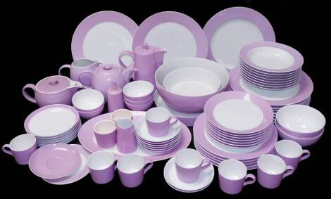 A comprehensive Pomance of Germany semi-porcelain part dinner service, to include large bowl, 28cm Dia. dinner plates, coffee pot, teapot, water jug, serving bowls, condiment set, oval meat platter, dinner plates, side plates, bread and butter plates, etc