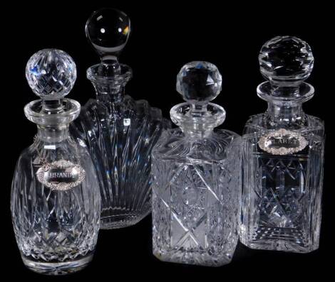 Various cut glass and crystal decanters, to include a flared circular example with orb stopper, unmarked, 31cm H, a mallet shaped decanter with cut glass circular stopper, another of square shouldered form, Waterford type, but unmarked and a silver clare