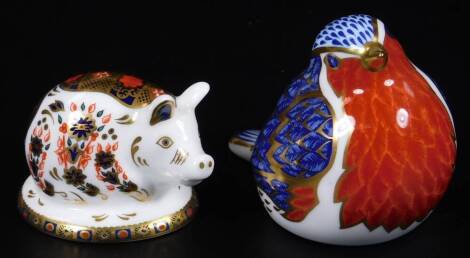 A Royal Crown Derby bird paperweight ornament, silver stopper, 6cm H, another pig. (2)