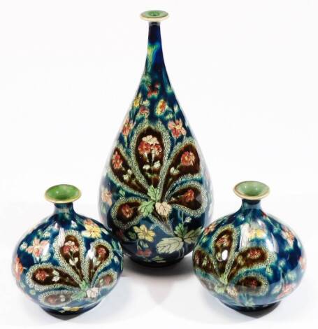 Various Dutch Royal Bonn limited edition pottery, comprising a pair of vases and another larger, each decorated with flowers on a turquoise ground, no. 5350/6, etc. the largest 31cm H. (3)