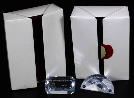 A boxed Swarovski crystal Isodora paperweight, 6cm W and another Pierot 1999. (2)