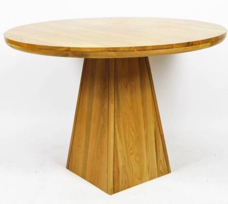 A light wood pedestal table, the circular top on tapering central stem, 81cm H, 110cm Dia.