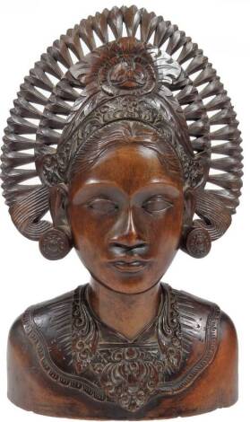 A Japanese carved wooden figure, of a lady in a partially pierced headdress, of shouldered form, unmarked, 29cm H.