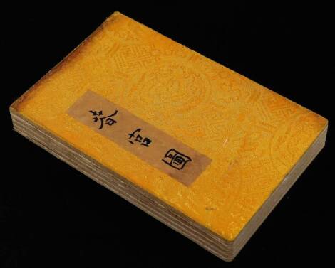 Japanese School. A erotic picture book, polychrome decorated, concertina action, in outer silk textured boards, 18cm x 12cm.