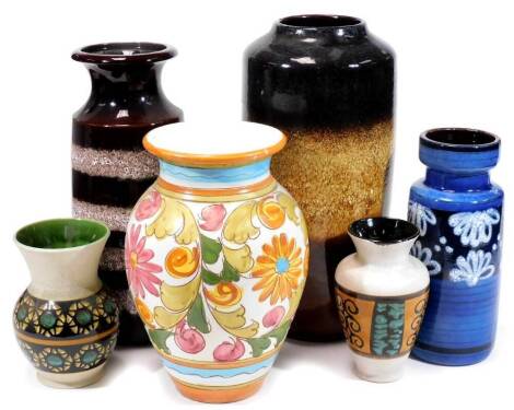 Various vases, Fat Lava and other type, West German 517-30 shouldered example decorated with a banding of flowers on a blue ground, raised marks beneath, various others, etc. (a quantity)