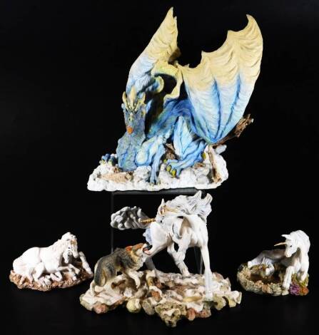 Various Enchanted matt figure groups, to include large dragon, 31cm H, two unicorn figures, unmarked and a similar unicorn figure fighting wolf, titled Courage, limited edition no. 463. (a quantity)