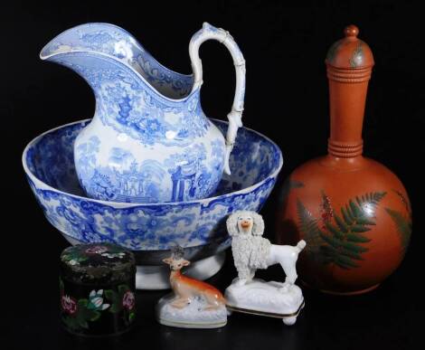 A 19thC red ware pottery decanter and cover, of bulbous form decorated with fern leaves, in green on a orange ground, unmarked, 32cm H, a 19thC blue and white transfer printed jug and similar bowl, cloisonné enamel jar and cover, a small Staffordshire fig