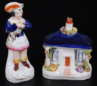 Various 19thC Staffordshire pottery figures, to include pastille cottage, polychrome decorated predominately in brown, pink and orange, 12cm H, a figure nursing child, a pair of miniature Staffordshire spaniels, figure holding mask, child spill group, fur - 14