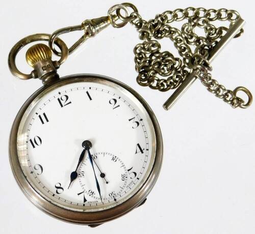 A George V silver open faced pocket watch, with 5cm Arabic dial with subsidiary second hand attached to a slender link chain with T bar end, the watch Birmingham 1925, 3oz all in.