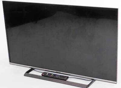 A Panasonic TX40CS520B LCD 40inch television, in silver and black trim, on stand