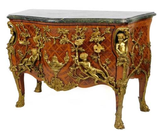 A Louis XIV style French kingwood and gilt metal mounted commode, after the model by Charles Cressant, of serpentine bombe form, the green veined marble finish top raised above a heavily cast body, set with figures, scrolls, cherubs and fronted by two dra