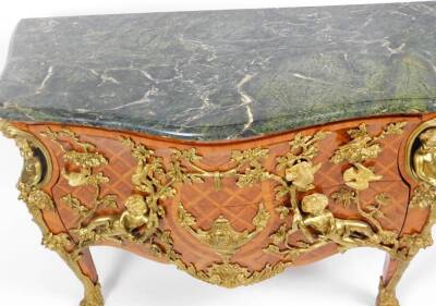 A Louis XIV style French kingwood and gilt metal mounted commode, after the model by Charles Cressant, of serpentine bombe form, the green veined marble finish top raised above a heavily cast body, set with figures, scrolls, cherubs and fronted by two dra - 2