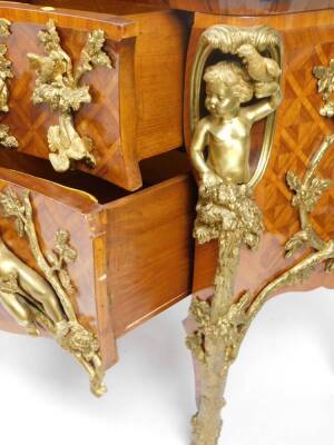 A Louis XIV style French kingwood and gilt metal mounted commode, after the model by Charles Cressant, of serpentine bombe form, the green veined marble finish top raised above a heavily cast body, set with figures, scrolls, cherubs and fronted by two dra - 5