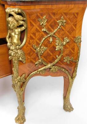 A Louis XIV style French kingwood and gilt metal mounted commode, after the model by Charles Cressant, of serpentine bombe form, the green veined marble finish top raised above a heavily cast body, set with figures, scrolls, cherubs and fronted by two dra - 6