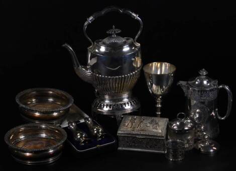 Various silver plated ware, silver, etc. a cased two piece cruet, 10cm H, 2½oz, a pair of old Sheffield plate coasters, an unmarked goblet, continental casket, spirit kettle on stand, various other wares, etc. (a quantity)
