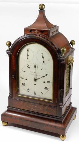 Thomas Nelson, Market Deeping. A 19thC mahogany bracket clock of large proportion, surmounted by an inverted section with orb finial, above a domed case set with four further orb finials, flanked by lion mask and ring handles, with blind fret metal sides