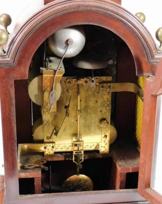 Thomas Nelson, Market Deeping. A 19thC mahogany bracket clock of large proportion, surmounted by an inverted section with orb finial, above a domed case set with four further orb finials, flanked by lion mask and ring handles, with blind fret metal sides - 3