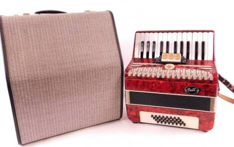 A mid 20thC Bell piano accordion, in red and chrome finish colours, with sixteen main keys and three central buttons, marked, 34cm W. (cased)